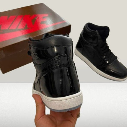 Black Jordan 1 with Space Jam branding on the tongue and heel