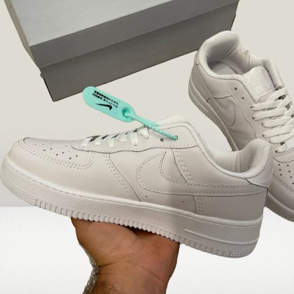 Detailed close-up of Nike Air Force 1’s stitched leather upper
