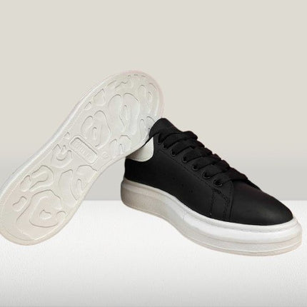 Premium Alexander McQueen Black sneakers with white elements