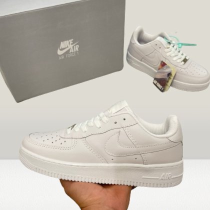 Side view of classic Nike Air Force 1 shoes with iconic rubber sole