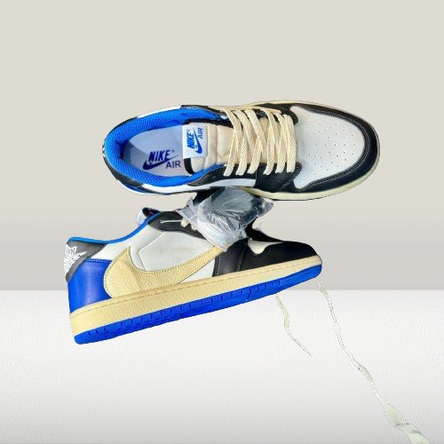 Side view of limited edition Travis Scott Dunk Lows shoes
