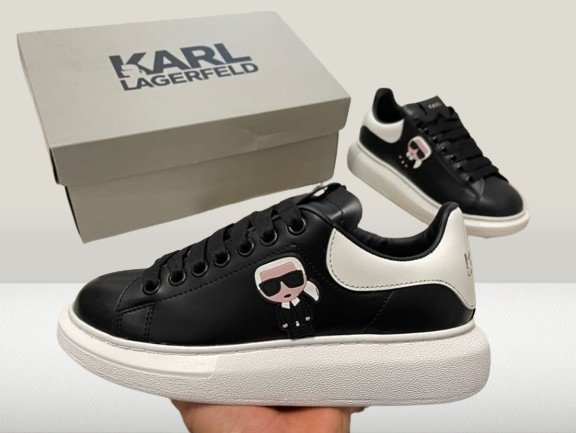 Sleek Karl Lagerfeld designer shoes in black with white accents and branded heel