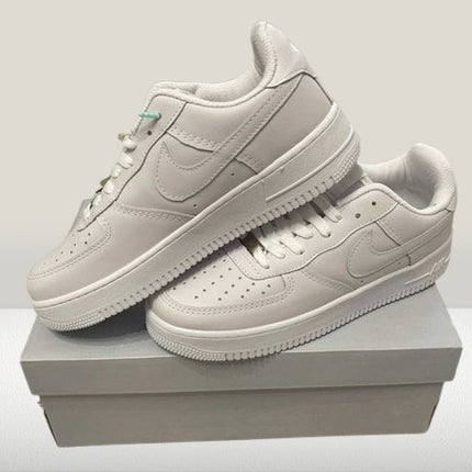 White Nike Air Force 1 sneakers on a clean background