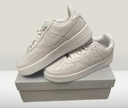 White Nike Air Force 1 sneakers on a clean background